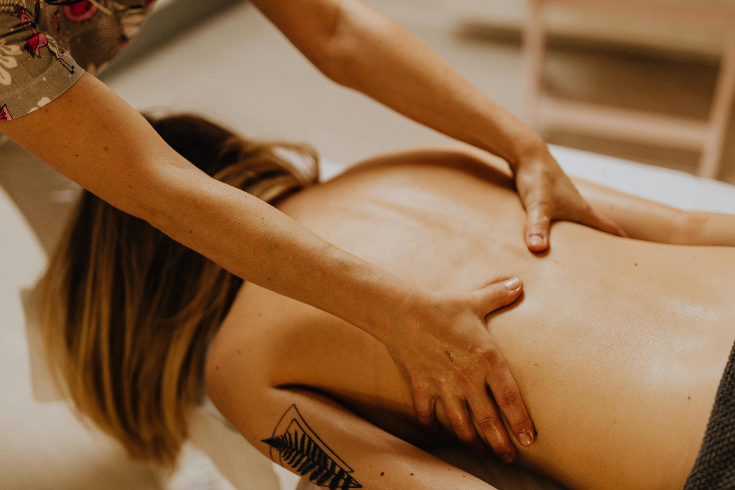 Close-up of a massage therapy session with focus on relaxation and wellness.
